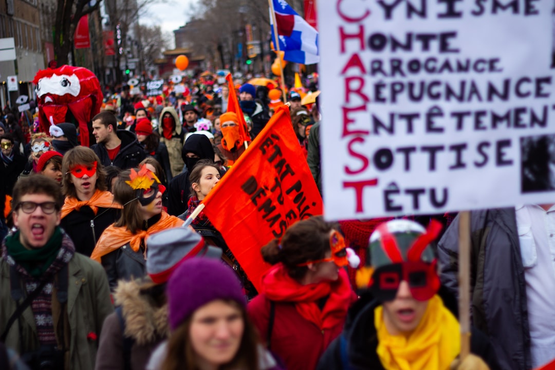 a group of people holding signs