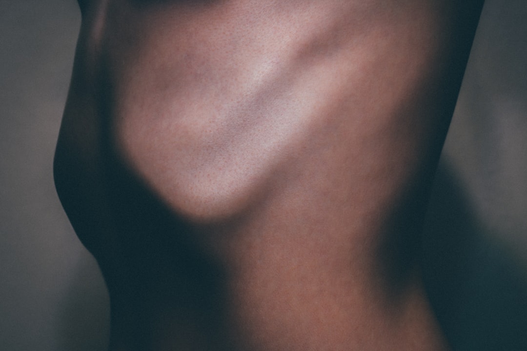 a close up of a person's bare torso